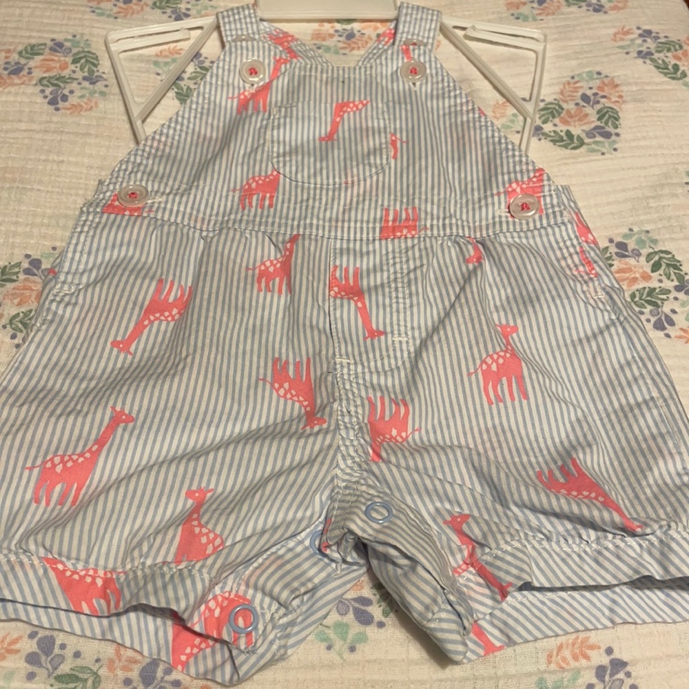Blue and white stripes with pink giraffes
